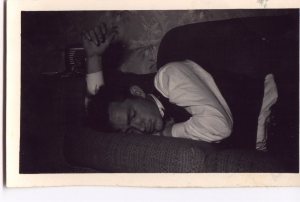 Lawrence Haley, asleep after work, 1950s