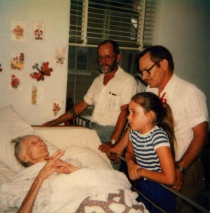 Jack Haley and Lawrence Haley at the bedside of Minnie Hicks