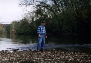 Cecil Lambert standing on the "green shoals" of Guyandotte River, Lincoln County, WV, 1996